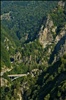 Two viaducts, a winding road and mountain tunnels